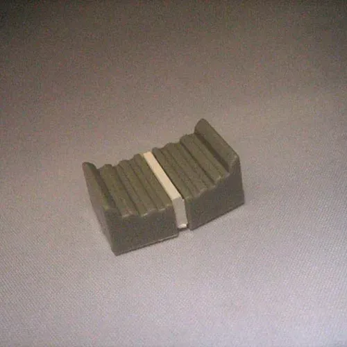 T.E.G. schuifknop 22x14 grijs kunststof